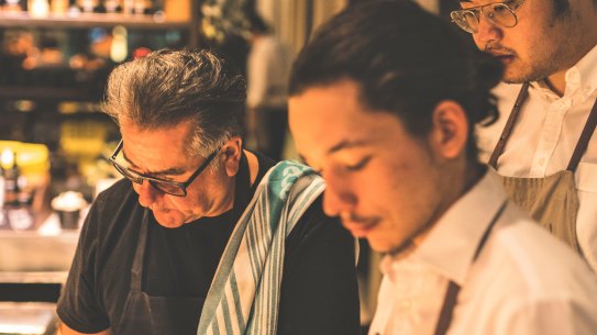 Guy Grossi in action in the kitchen.