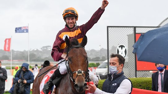 A jubilant John Allen returns to the mounting yard aboard State Of Rest before the protest.