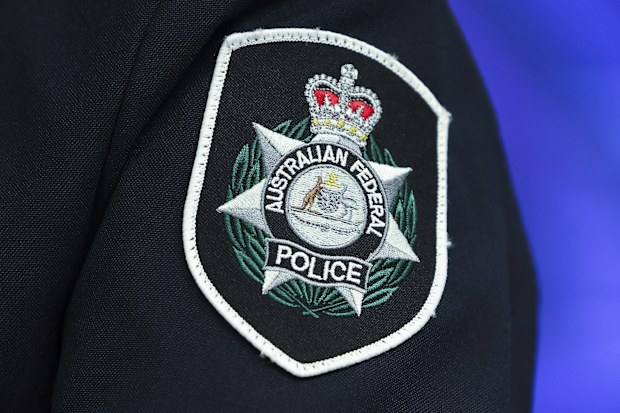 Generic stock photo of the Australian Federal Police (AFP) logo seen on a uniform, in Canberra on Wednesday 29 October 2025. fedpol Photo: Alex Ellinghausen