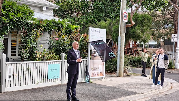 Jellis Craig Richmond auctioneer Luke Schickerling calls for bids at 266 Mary Street.