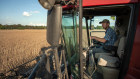 A farmer harvests his soybean crop in Pace, Mississippi.