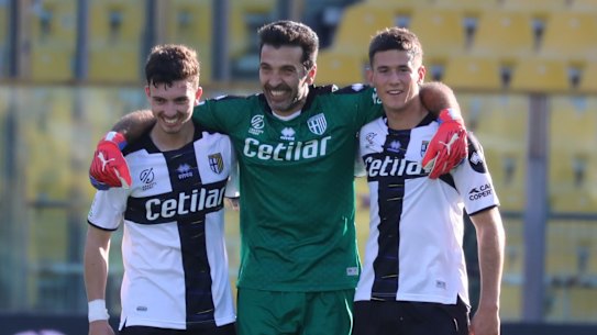 Alessandro Circati (right) with Italian legend Gianluigi Buffon, who is still playing for Parma at 44 years old.