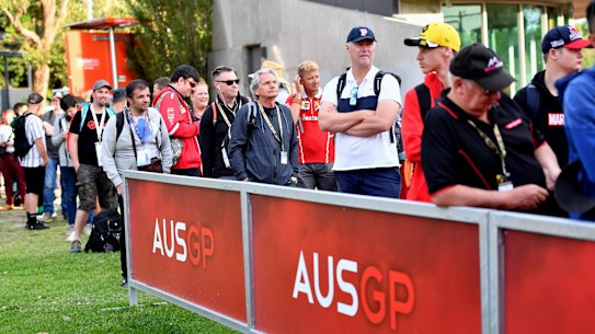 Spectators arrive at Albert Park, as uncertainty hangs over the Australian Grand Prix.