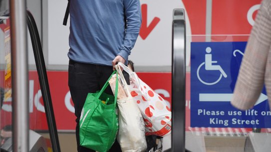Coles flips again on plastic bag ban, puts end date on freebies