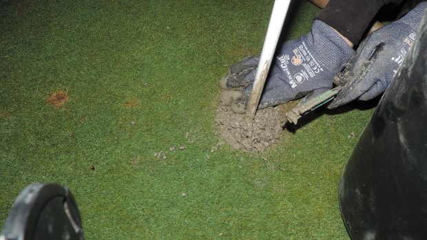 French activists fill golf course holes with cement in protest at watering exemptions