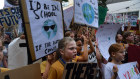 School children at a climate change protest near the office of Tony Abbott in Manly.