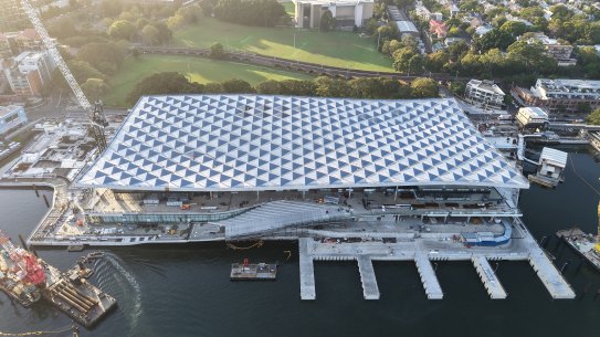 The roof comprises 400 panels arranged to resemble fish scales.