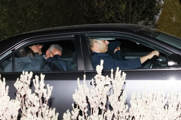 Iranian officials leave the Iranian embassy in Canberra on Tuesday night, after ambassador Ahmad Sadeghi was expelled from the country.