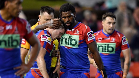 Knights winger Edrick Lee celebrates one of his record five tries against the Titans.