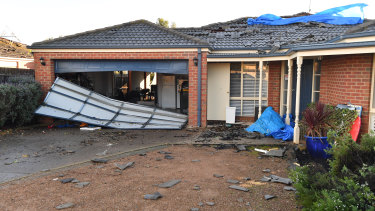 Garage doors were ripped off by the storm. 