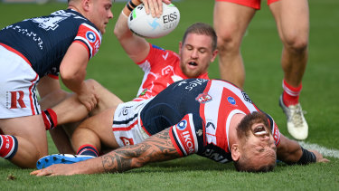 Jared Waerea-Hargreaves in agony after being twisted awkwardly while making a tackle against the Dragons.