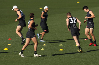 Eddie Betts (centre) has a laugh during Blues training.