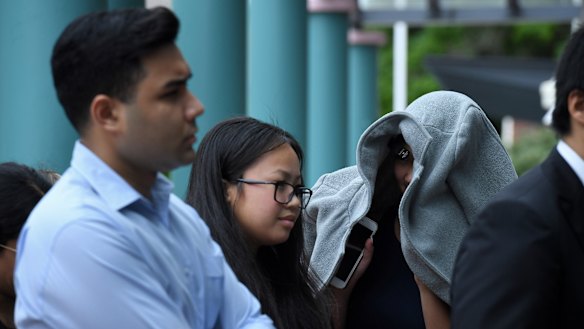 Tina Phan (middle) arrives at Burwood Local Court on Thursday.
