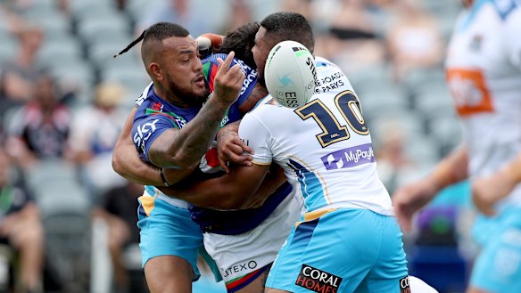 Warriors recruit Addin Fonua-Blake gets away an offload against the Titans on Saturday.