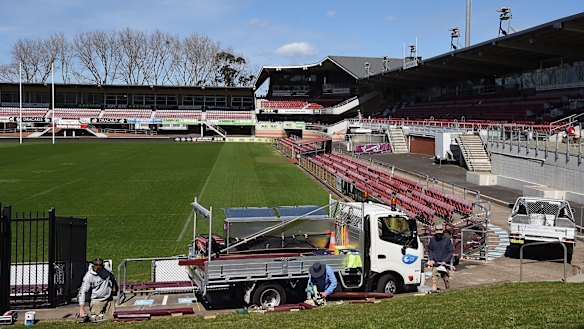 Tradesmen at work at Brookvale Oval after traces of asbestos were found at the Sea Eagles' home.  The ground was given the all-clear by the NRL on Monday night.