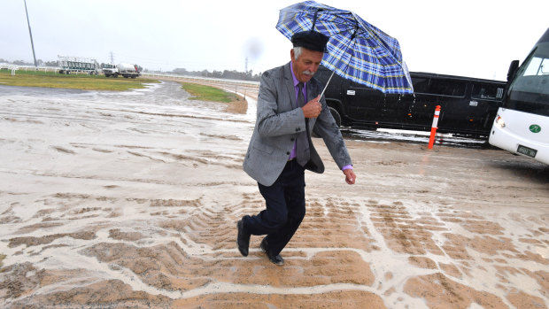 Racegoers faced a heavy track at Flemington on Cup Day last year.
