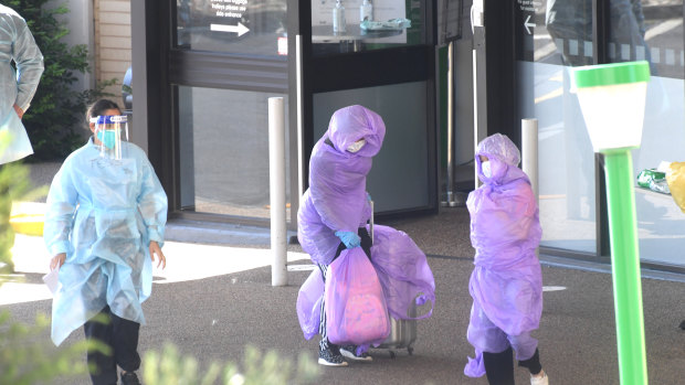 Patients were covered in plastic to be transported from the Holiday Inn to the Pullman Hotel.
