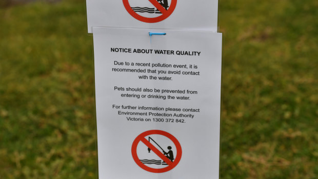 Melbourne Water employees put up warning signs at the Warmies around 5pm on Friday.