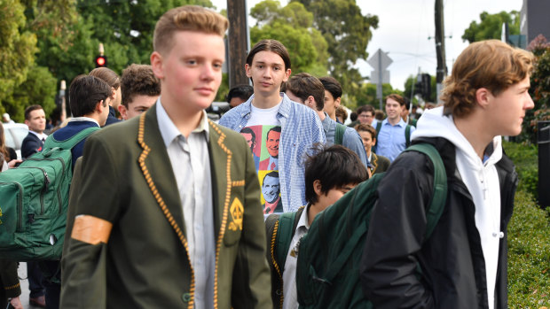Trinity Grammar year 12 students protested against the sacking of their vice-principal by wearing "smart casual" clothes to school.