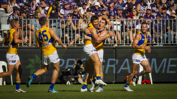 West Coast celebrate a Josh Kennedy goal during the Western Derby.