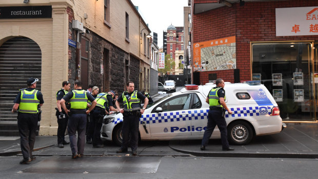Police investigate the scene where Ms Angok's body was found on Celestial Avenue in the CBD on Wednesday.