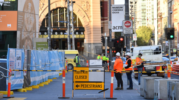 Traffic has been reduced from two lanes to one on Flinders Street as Metro Tunnel works in the area ramp up.