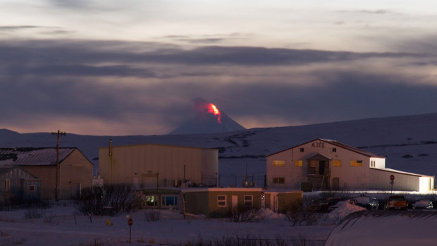 Lava flows from a vent on the Shishaldin Volcano, as seen from Cold Bay, Alaska.