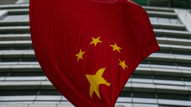 Chinese flag flies outside the Office for Safeguarding National Security of the Central People's Government in the Hong Kong.