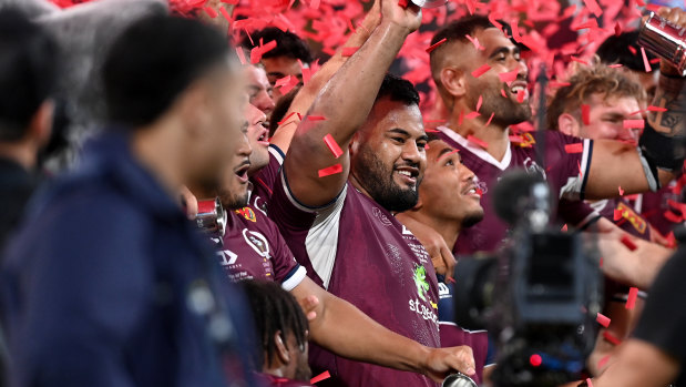 Taniela Tupou celebrates the Reds’ victory on Saturday night.