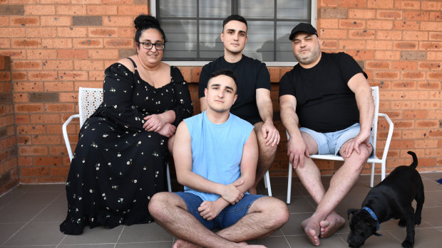 Carol and Stephen Seguna and their two sons Stephen, 21, and Julian, 15. The parents have let both sons decide whether to get vaccinated. 