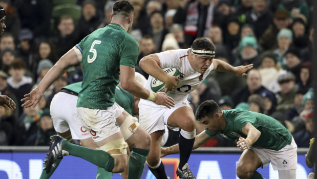 Brute force: Jamie George runs at Ireland's Conor Murray and James Ryan.