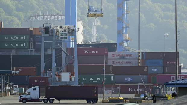 Chinese containers are moved by crane at the Port of Tacoma in Tacoma, Washington state, US.