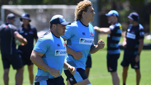 Ned Hanigan, right, is expected to start in the back row in the Waratahs' season-opening clash with the Hurricanes on Saturday. 