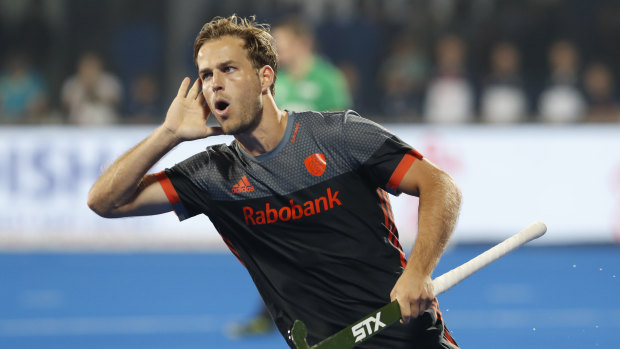 Finalists: The Netherlands' Jeroen Hertzberger celebrates after scoring off a shoot-out.