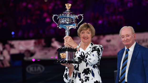 Margaret Court on Monday evening with Rod Laver at Rod Laver Arena, where she was presented with a replica of the Australian Open trophy to commemorate the 50th anniversary of her 1970 calendar-year grand slam. 