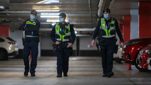 Police patrolling an underground car park in Melbourne's CBD.