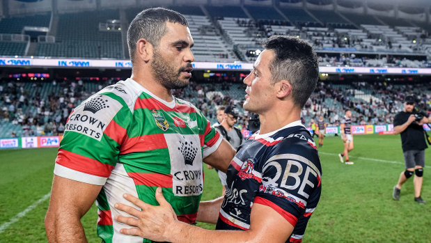 Greg Inglis (left) and Cooper Cronk after last year's preliminary final won by the Roosters.
