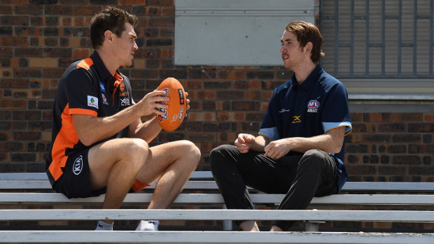 'It’s great for the game': Giants player Jeremy Cameron with Young Athlete of the Year with a Disability finalist Adam Orchard.