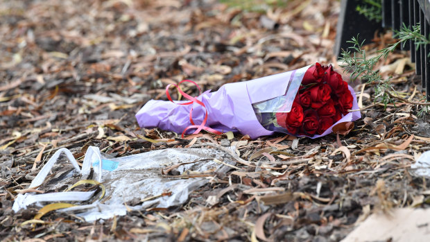 Flowers at the site of an car accident with killed a young girl in Rowville. 