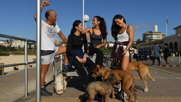 Charlie Teo with his daughters (left to right) Katie, left, Nikki, centre, and Alex aheadof the City2Surf in 2019.