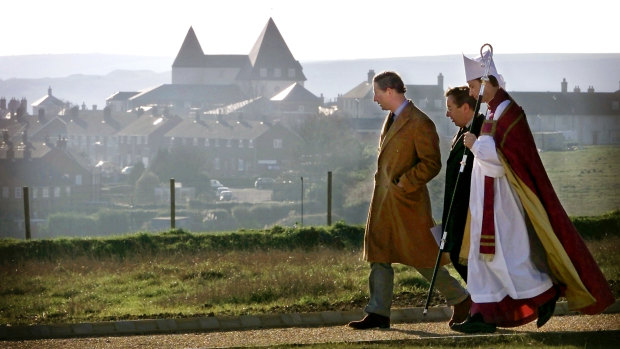 Charles attends a consecration ceremony in 2004 at Poundbury, a traditionalist village built on Duchy of Cornwall land.