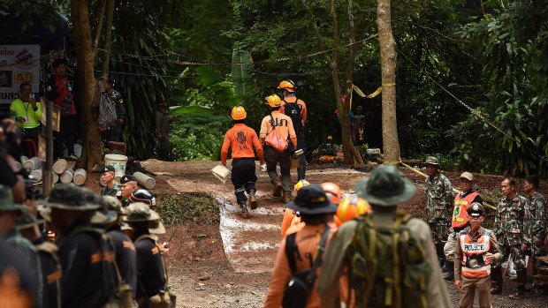Thai soldiers and rescuers go through an exercise at the base camp where the rescue operations are being planned.