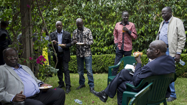 Members of the Sudanese community at one of Hugh McDermott's backyard barbecues. 
