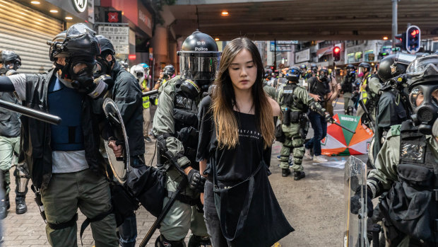 Protesters are arrested during clashes. 