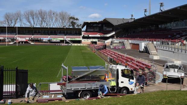 Tradesmen at work at Brookvale Oval after traces of asbestos were found at the Sea Eagles' home.  The ground was given the all-clear by the NRL on Monday night.