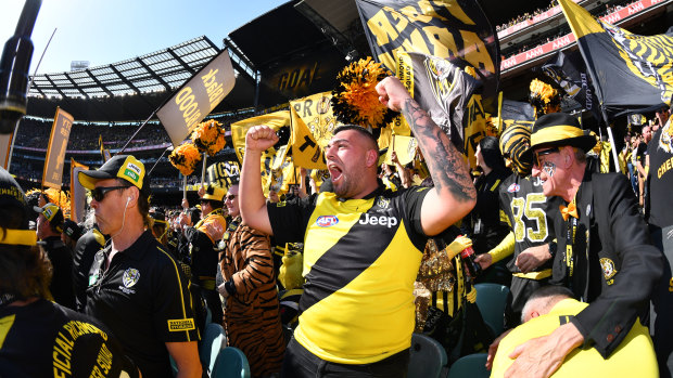 Members of the Richmond cheer squad roar in appreciation at the Tigers' thumping win over the Giants.
