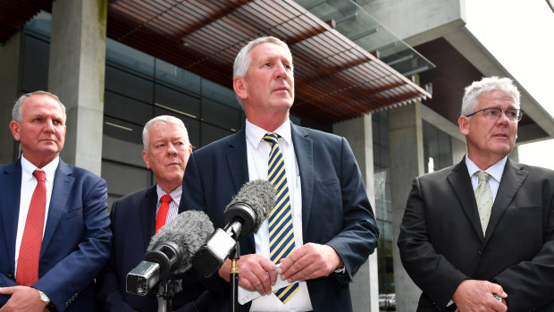 Joe, John, Dennis and Neill Wagner speak to the media outside the Supreme Court after the verdict in their defamation proceedings against Alan Jones. 