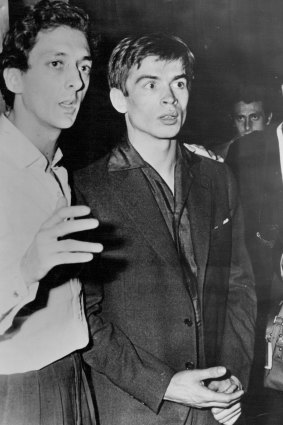 “Rudolf Nureyev  (right) seen with Mr. Larrain, art director of the Marquis De Cuevas Ballt, in Paris.” June 23, 1961