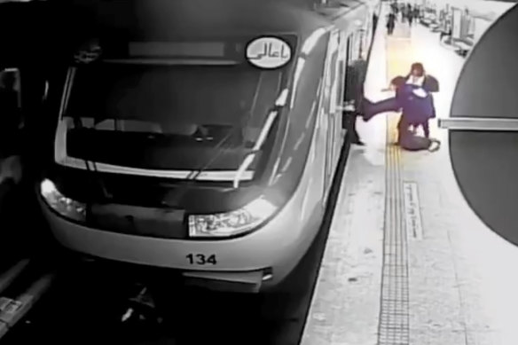 Surveillance video aired by Iranian state television, shows women pulling 16-year-old Armita Geravand from a train car on the Tehran Metro.