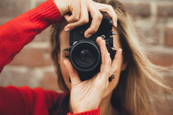 A new generation is discovering the “wait-and-see” joy of traditional film cameras.